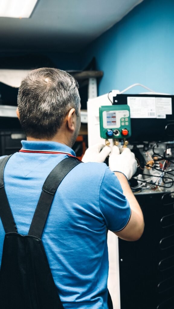 Technician providing appliance repair near me in Sherbrooke and appliance repair Lennoxville